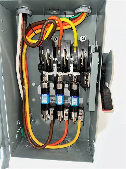 Fused safety disconnect wired with color-coded phase conductors
